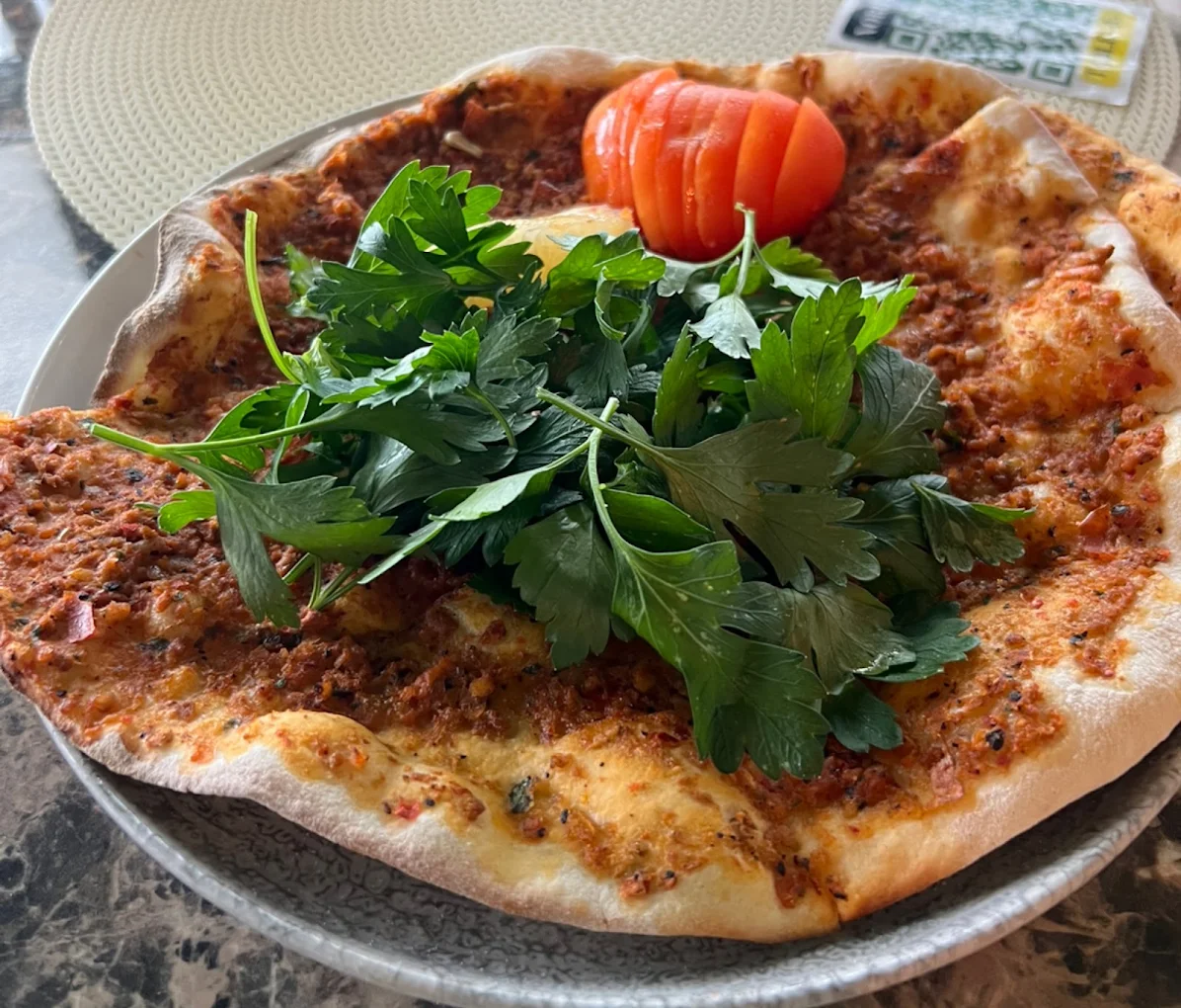 Lahmacun with fresh herbs